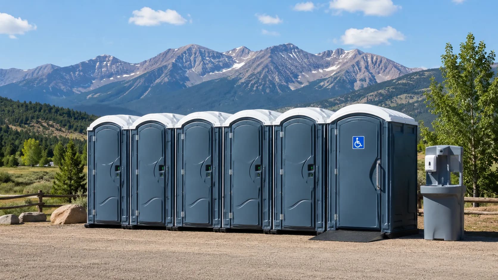 Row of portable toilets and ADA unit in Colorado rental setting